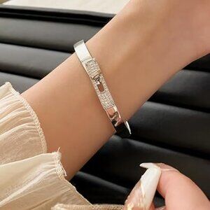Neiman Marcus 18K White Gold Plated Turn Lock Bracelet